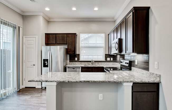 Horizon at Premier apartment interior kitchen with stainless steel appliances