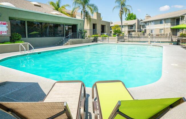 Poolside Relaxing Area at Heron Pointe Apartments & Townhomes, Fresno, California