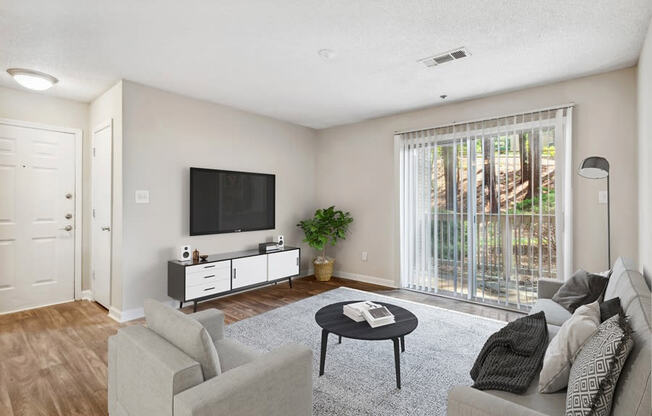 Model living room with patio door