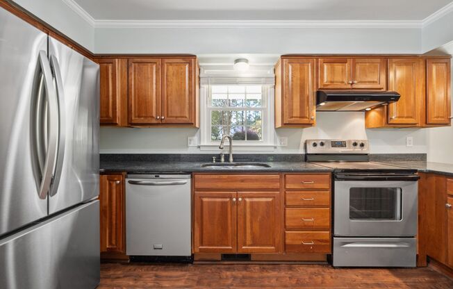 Spacious Oasis! Gorgeous 4 bedroom, 3 full bath in fantastic Raleigh location!