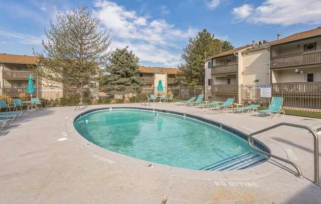 our apartments have a resort style pool with chairs