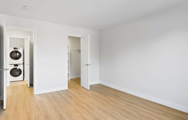 Bedroom with In-home Washer and Dryer