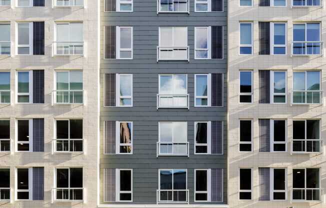 a large apartment building with a street in front of it at Slabtown Square Apartments, Oregon, 97209