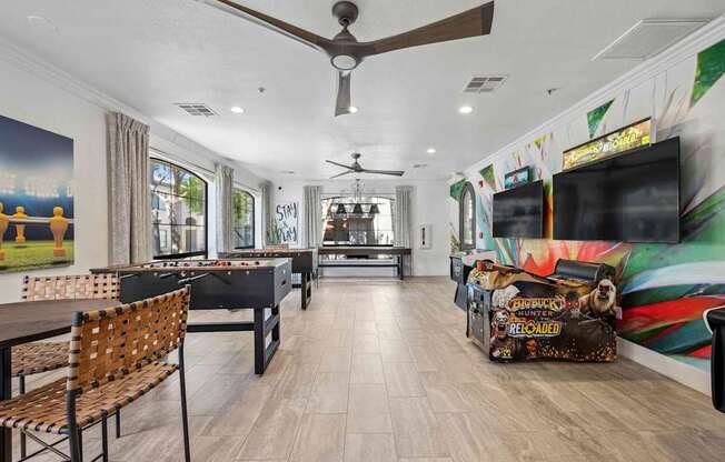 A room with a pool table and a bar area. at Lazo Apartment Homes, Chandler