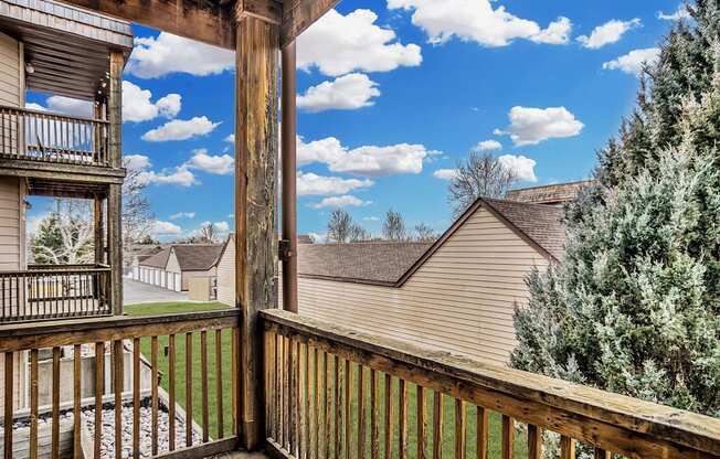 the view from the deck of a home with a porch