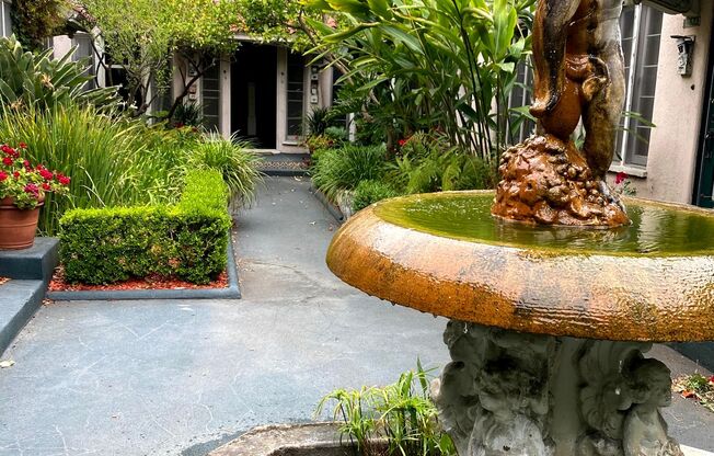 1002-1012 1/2 N. Sweetzer Ave.