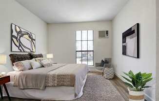 a bedroom with a large bed and a large window