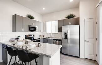 Gourmet Kitchen With Island at Avilla Meadows, Arizona, 85379