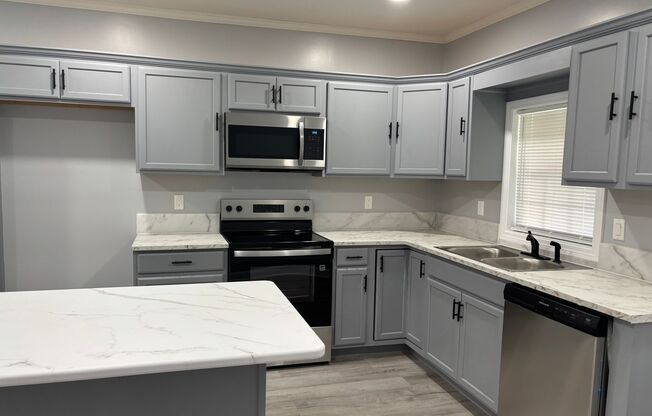 Fully renovated 3 bedroom 2 bathroom house!   Lawn Care Included