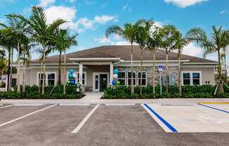 exterior view of Vantage Apartments clubhouse in cape coral, fl
