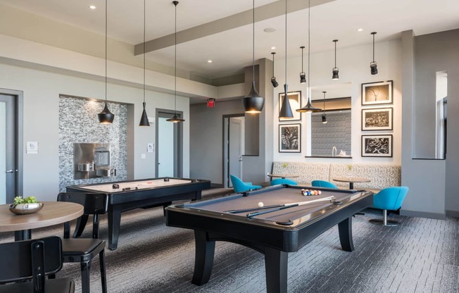 gaming lounge with billiards and shuffle board at Tinsley on the Park apartments