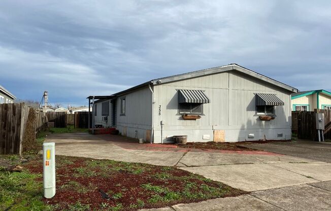 Spacious Manufactured Home with a Fenced Backyard!