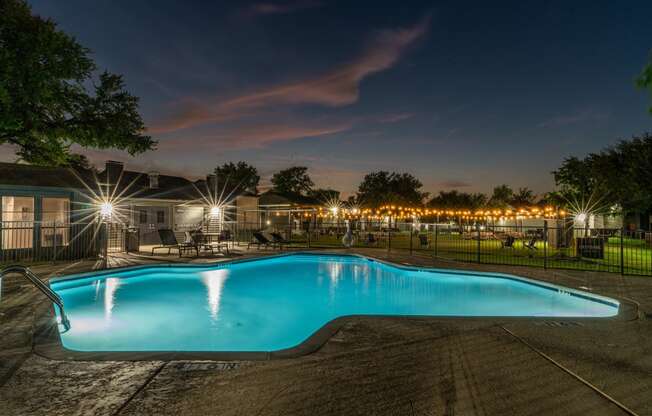 a swimming pool at night at night