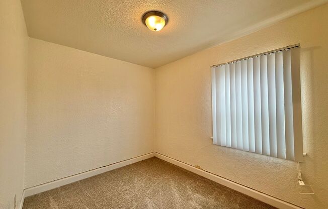 2 Bedroom Cottage nestled in City Heights! With Parking!!