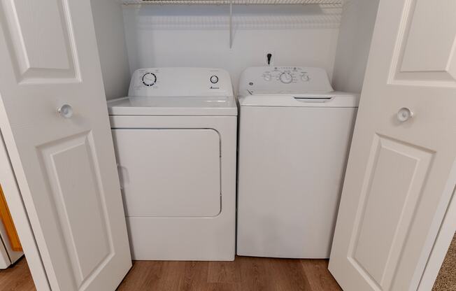 a washer and dryer in the laundry room of a home