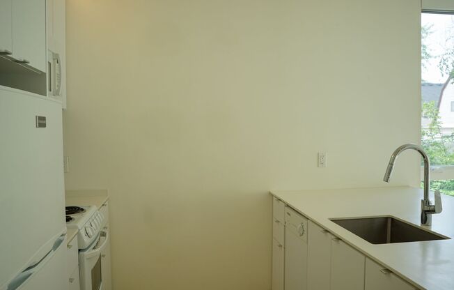 Modern 2nd Floor Corner Studio with D/W & Washer/Dryer!