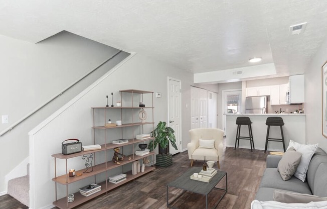 Model living room with a couch and a coffee table