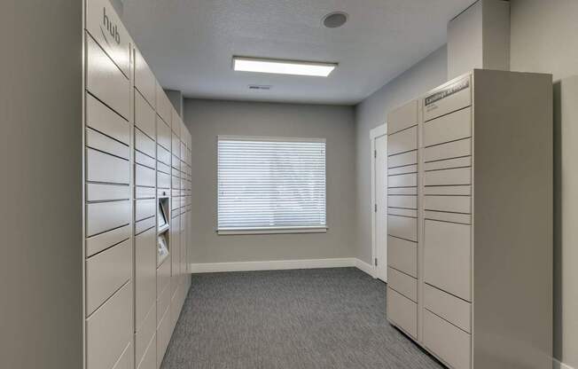 Community Parcel Package Room at Landings at Morrison Apartments located in Gresham, OR.
