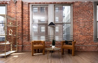 a kitchen and dining room with a table and chairs