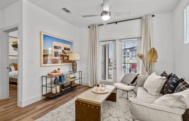 a living room with a couch and a table