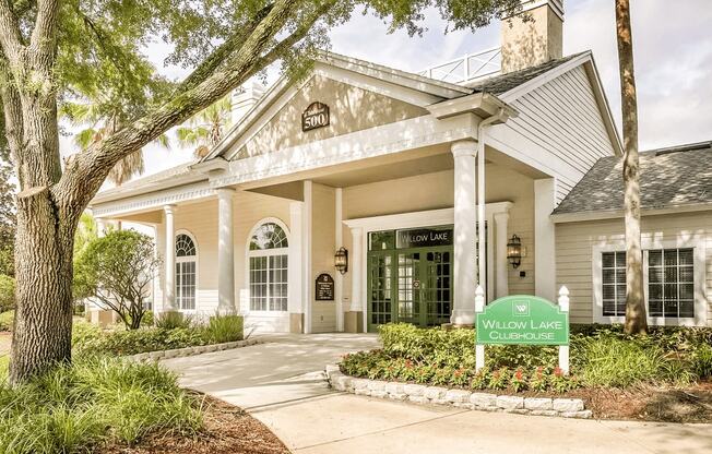 Leasing office exterior surrounded by native landscaping