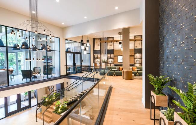 Designed to impress from every angle, this elevated lounge level blends striking architecture, statement lighting, and views of the vibrant community below.