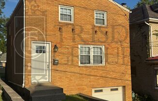Move In Ready! Brick Single Family Home with GARAGE, Fenced Yard, AC, Laundry, Hardwood Floors, Pets Ok!