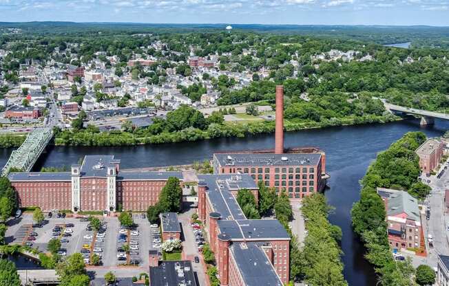Mass Mills apartments in lowell aerial view of merrimack river
