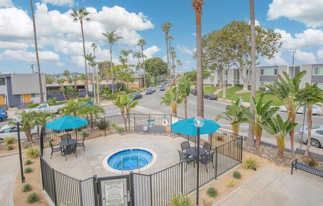 a table topped with a blue umbrella
