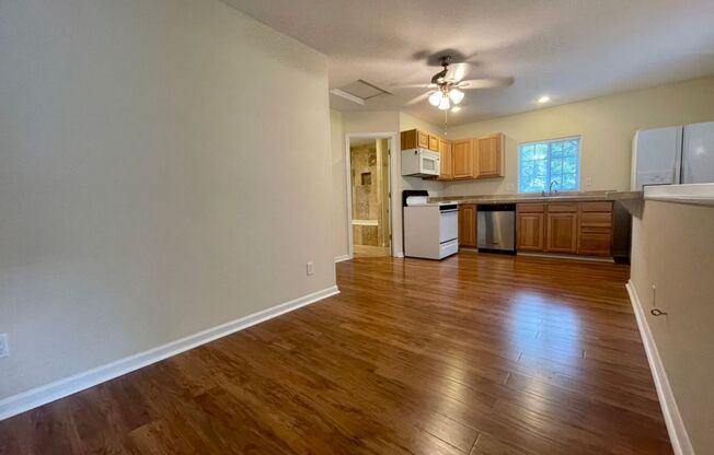 Spacious One Bedroom in Quiet 5 Plex with Courtyard Setting~ Open Floor Plan~ Great Shared Outdoor Space~ Off Street Parking!