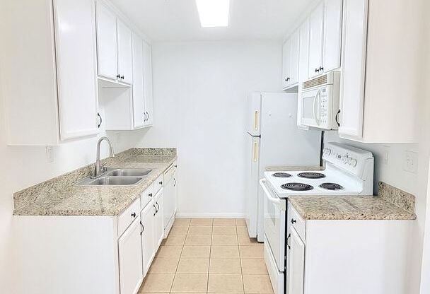 2 Bed / 1.5 Bath Downstairs Corner Condo at Blossom Walk
