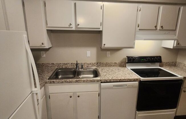 Lovely 1 bedroom 1 bath 2nd floor condo with washer/dryer hook-ups inside unit and dishwasher!!