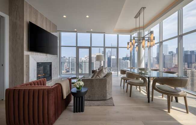 a living room filled with furniture and a large window