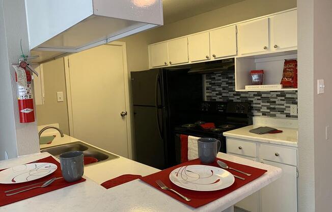 a kitchen with a stove top oven sitting inside of a refrigerator