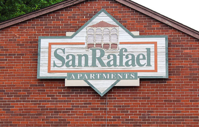 a building with a sign that says san rafael apartments