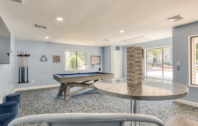 Game room at Compass at City Center Apartments