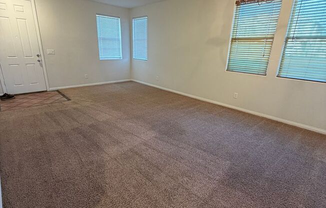 AMERICANA Property Mgmt - Spacious 3 beds + Den & Loft in a 2 story home in North Las Vegas.