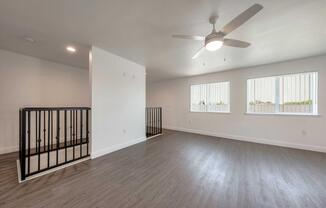 Upstairs Bedroom with Ceiling Fan Stairs View.jpg