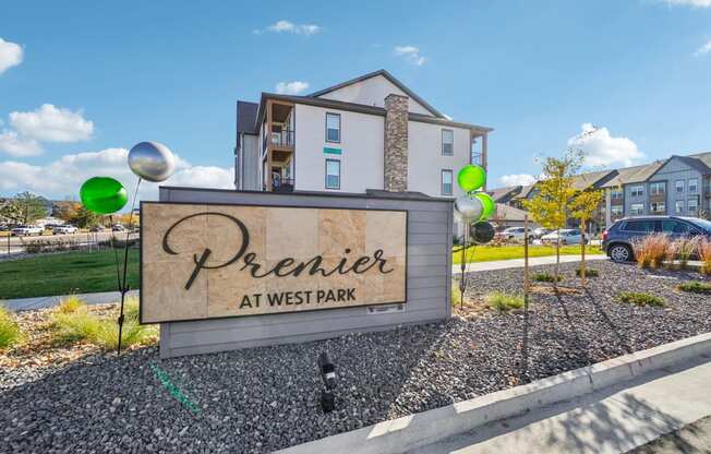 the preserve at west park sign in front of an apartment building