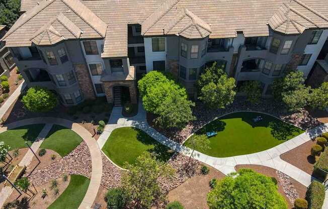 A large apartment complex with a courtyard in the center.