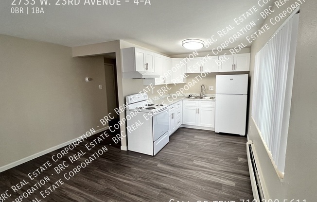 2733 W 23 AVE