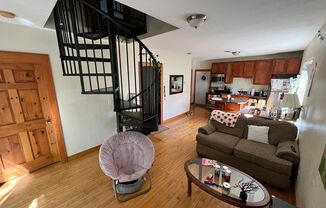 Spacious Two-Bedroom Upper with Lofted Bonus Space on Milwaukee’s Upper East Side