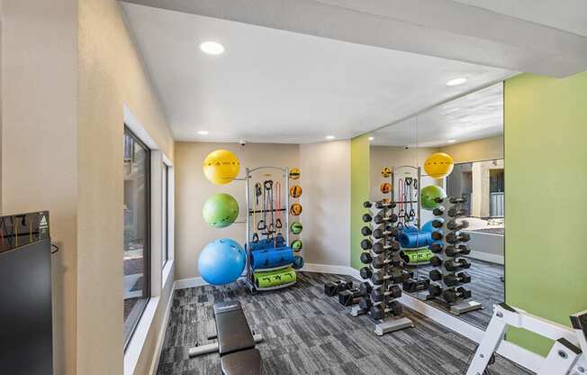 Community Fitness Center with Equipment at Saddle Ridge Apartments in Tucson, AZ.