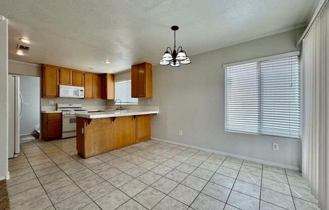 New Paint and Carpet! 4 Bedroom 3 Bath house For Rent!