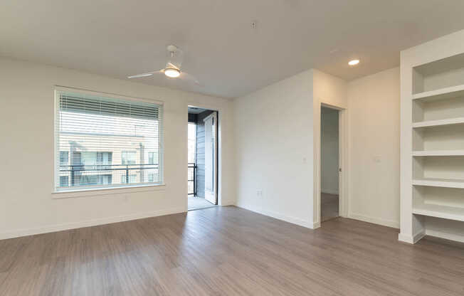 Living Room with Balcony and Hard Surface Flooring