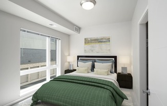 One BR Apartments in Lakeville MN - Lakeside Flats - Carpetted Bedroom, Unfurnished, with Light Grey Walls, Large Windows, and Overhead Lighting