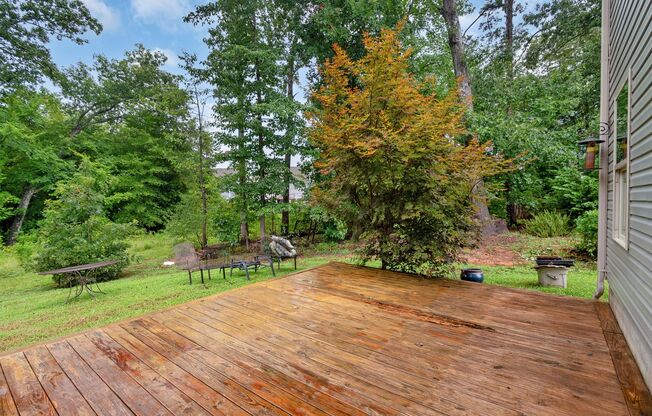 Spacious 4-Bedroom Home with Sunroom, Deck & Private Backyard Views!