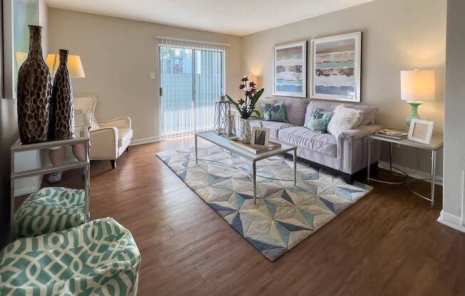 a living room with a couch and a table