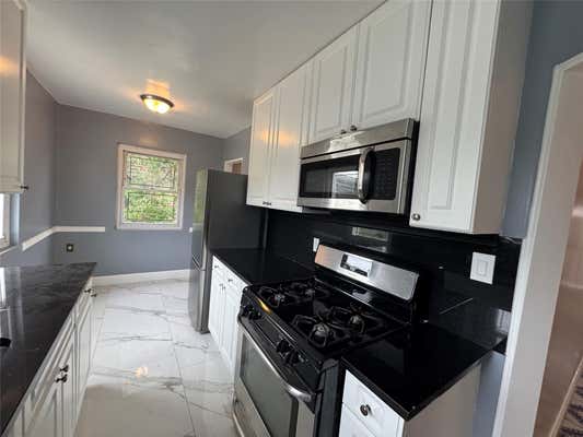 153 32 77 AVE