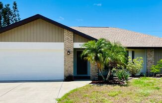 UPDATED 3/2 IN PORT CHARLOTTE WITH HUGE PORCH